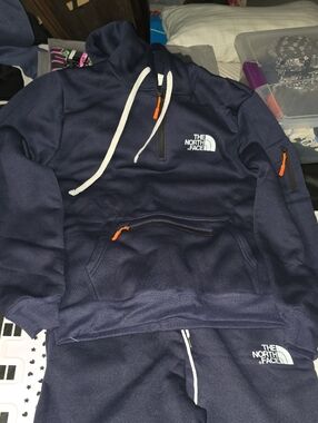 The North Face Men’s Navy Pullover Hoodie with Orange Zip Accents